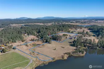 Northeast vantage of the property features a dogleg access to Woods Reservoir. Ideal for recreational access.