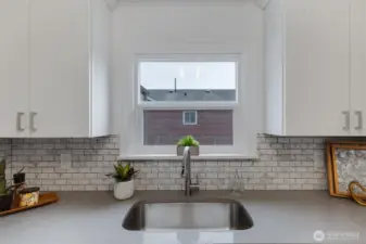 Kitchen with stainless garden sink