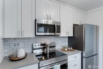 Full Kitchen Right side including stainless fridge