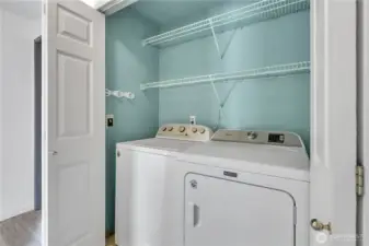 washer dryer set in hallway