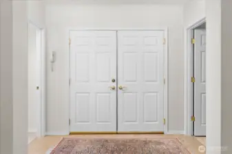 2nd bedroom is to the left and laundry is to the right in this view.