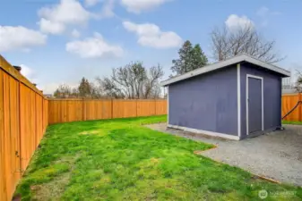 Oversized shed/workshop offers additional storage options.