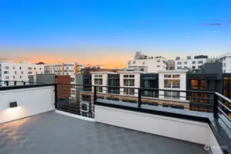 Elevate your evenings on this stunning rooftop deck with panoramic city views. Whether you’re hosting friends or enjoying a quiet moment, the Capitol Hill skyline and vivid sunsets set the perfect backdrop.