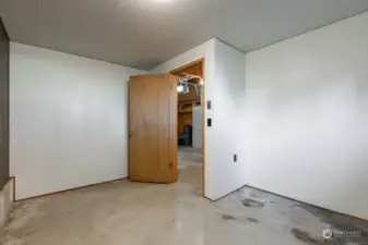 Reverse view of extra room in garage.