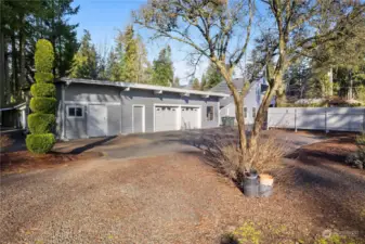 Bonus - Detached Garage - 2 car doors, but equals the size of most 4 stall garages. Includes a space for a workout room?