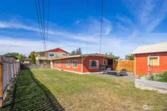 2bed/1bath home with upgraded windows, natural gas freestanding stove, covered patio, and a great rental history!