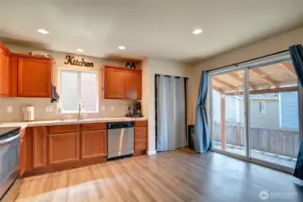 Large slider provides natural light in the kitchen and access the back yard.