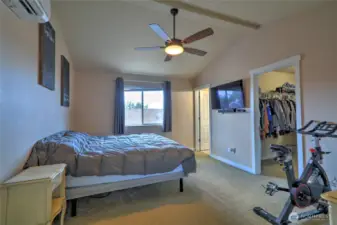 Large primary bedroom with vaulted ceilings