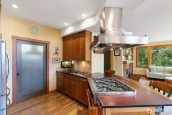 Stove is the center of all that happens in this open floor plan.