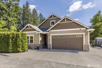 Beautiful home with great features like durable cement planked siding, wired for generator, wired for EV charging, and includes a plumbing leak alert system!