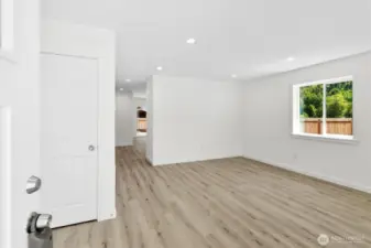 Living room complete with coat closet.