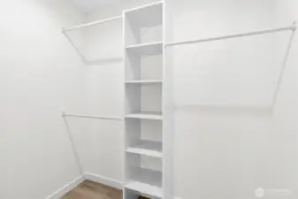 Primary walk-in closet.