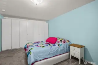 A tranquil space with abundant closet storage, making every morning feel organized and serene.
