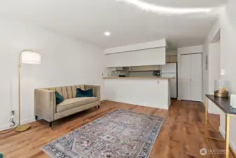 Tastefully updated with hard-surface floors throughout, freshly painted in a soothing neutral cream, and accented with stylish brushed-gold fixtures for an elegant, modern touch