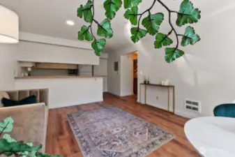 Tastefully updated with hard-surface floors throughout, freshly painted in a soothing neutral cream, and accented with stylish brushed-gold fixtures for an elegant, modern touch