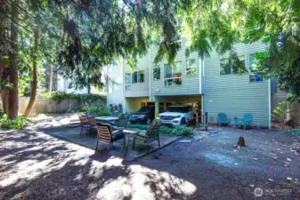 Step into a garden sanctuary where neighbors become friends and every path is an invitation to linger.