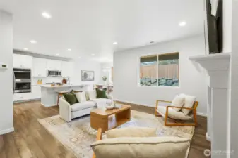 Great room, kitchen and dining area all open to each other and offer a great space for entertaining