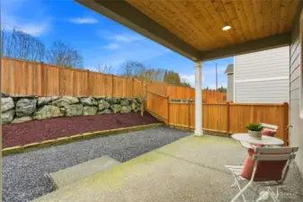 Covered patio and fully fenced yard offers a great space for entertaining year-round