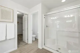 En-suite bathroom features double sinks, shower and large walk-in closet