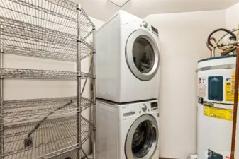 Separate laundry room with full size washer/dryer.