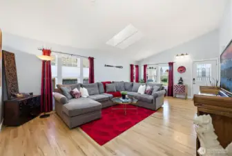 Open floor plan  with skylights