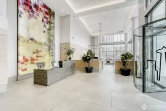 Main lobby, concierge desk, coffee shop in back