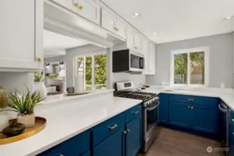 Gorgeous kitchen with new quartz countertops and brand new dishwasher.