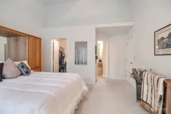 Primary bedroom wtih big walk-in closet, vaulted ceilings & a gorgeous remodeled bathroom