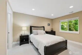 Spacious Bedroom #3 upstairs with large walk-in closet, new carpet & interior paint.