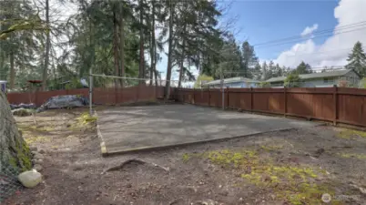 This stunning property features a spacious and inviting yard perfect for outdoor enthusiasts. Enjoy your very own sand volleyball court, ideal for entertaining guests or staying active.