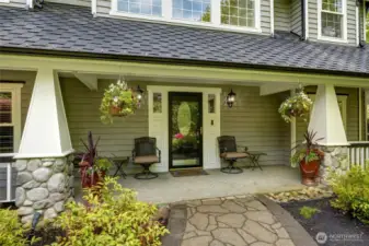 Covered entry way continues around the side. 50 Year old presentation Roof installed 2 years ago.