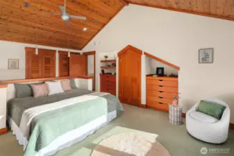 Built in bed, vaulted warm wood ceilings, custom built-in dressers and Juliet balcony overlooking the living room and private outdoor balcony to take in the views, reflect and relax.