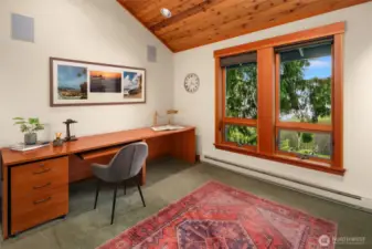 Upper floor office with vaulted ceilings at the opposite end of the home. Every detail in the home is lovingly conceived and masterfully realized.