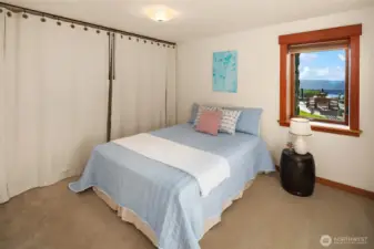 Lower level bedroom with 3/4 bath opposite.