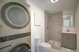 guest bath, with washer dryer tower. Glass shower door has been installed!
