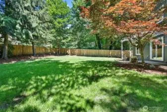 Full fenced oversized back yard