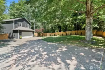 A generous driveway and 2-car garage provide plenty of parking.