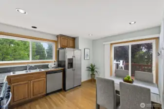 Your kitchen has stainless appliances and room for a table.