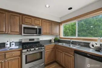 Lots of cabinet space and gas cooking!