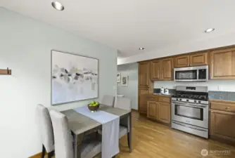 Pantry cabinet on the far left.