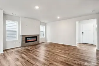 Open Concept living/Dining/Kitchen-Disclaimer- Photos are from a similar floor plan from another community, photos are for illustrative purposes only. Finishes, flooring, features, upgrades, countertops, paint, colors, and other features may vary.