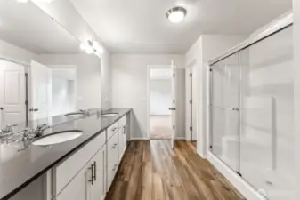 Primary Bath-Disclaimer- Photos are from a similar floor plan from another community, photos are for illustrative purposes only. Finishes, flooring, features, upgrades, countertops, paint, colors, and other features may vary.