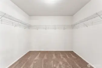 Primary WIC-Disclaimer- Photos are from a similar floor plan from another community, photos are for illustrative purposes only. Finishes, flooring, features, upgrades, countertops, paint, colors, and other features may vary.