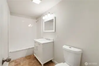 Tile surround tub/shower with bullnose trim & cultured marble countertop