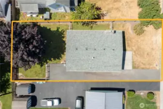 Spacious lot with a long driveway perfect for RV or trailer storage, with extra off-street parking for guests