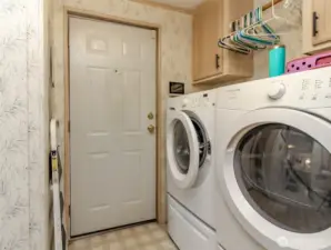Back door leading to  Carport &  Dryer & Washer aren't included with the sale