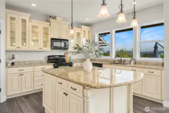 Chef's kitchen with large center island.