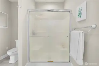 Primary Bathroom with step in shower.