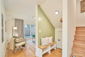 Immediately inside the front door you'll appreciate the modern farmhouse aesthetic, with shiplap accent wall, built in bench, under the stairs storage closet and real oak hardwoods.