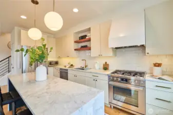 The West Elm lighting package continues in the kitchen and compliments the fixtures and handles perfectly.